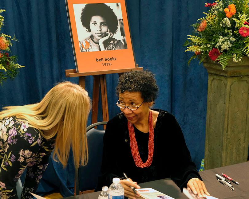 bell hooks signs books following her induction into the Kentucky Writers Hall of Fame in 2018. Photo by Tom Eblen/Lexington Herald-Leader